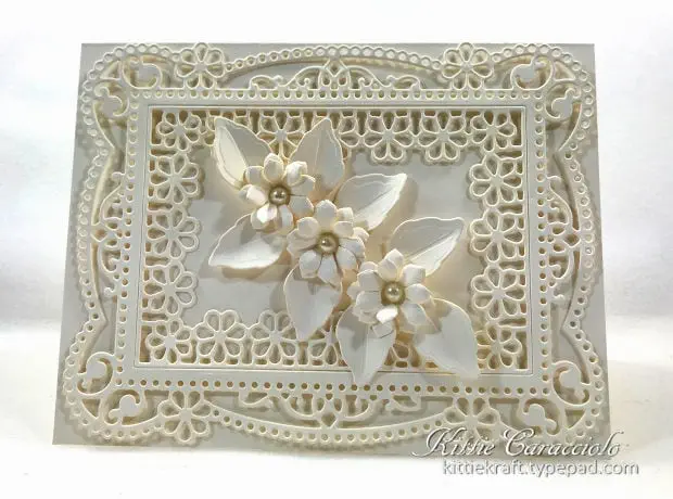 Handmade die cut paper flowers and delicate frame card