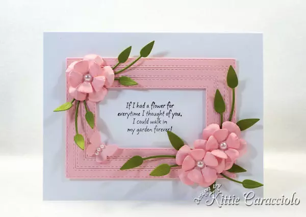 Using framed die cut paper flowers make such a lovely elegant card.