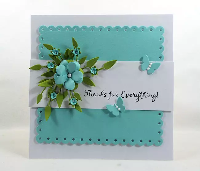 A die cut floral spray is a lovely addition to a card front.
