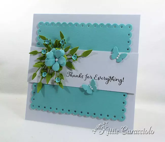 A die cut floral spray is a lovely and elegant addition to a card front.