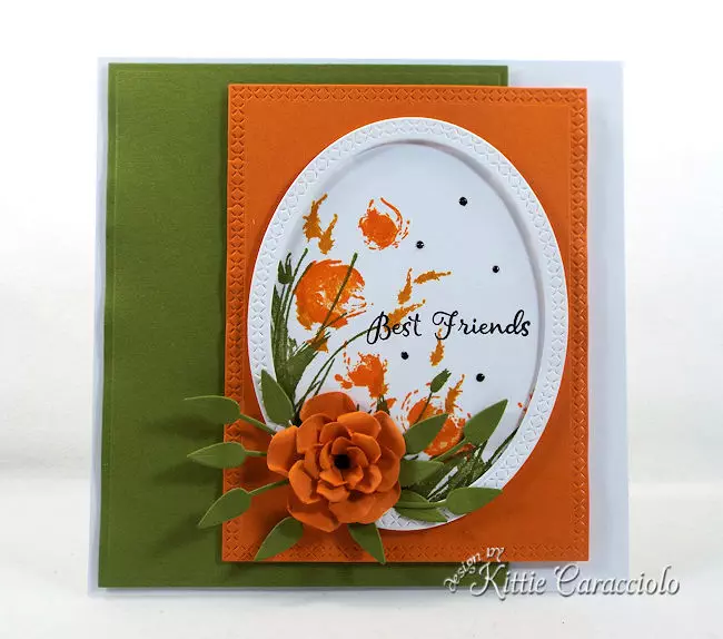 Die cut flowers and wildflowers creates a such a pretty card front.