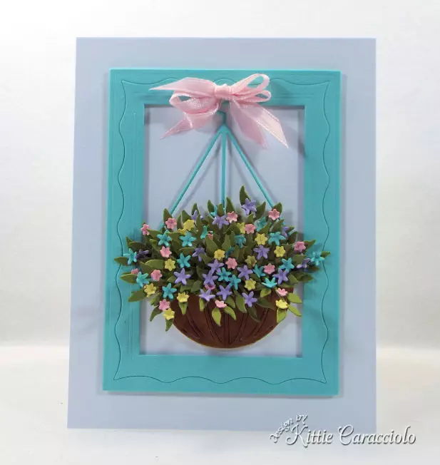 Check out how to use flower basket die cuts to create a gorgeous floral arrangement perfect on a card front for Mother