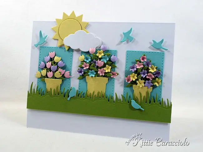 Come see how I made this cheerful die cut sunshine scene.