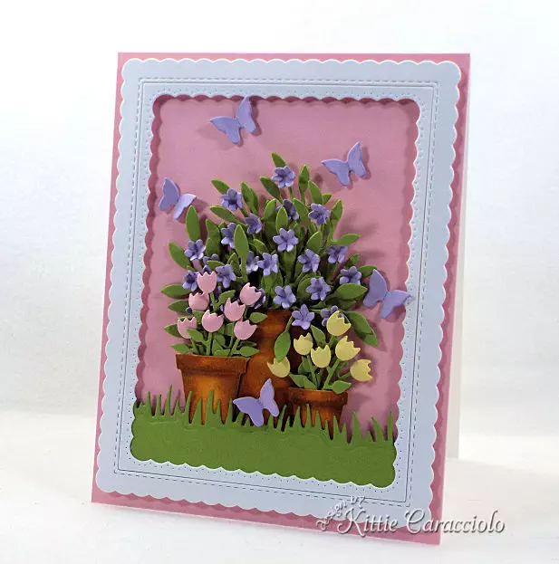 Come see how to make this spring die cut flower pots and butterflies project.