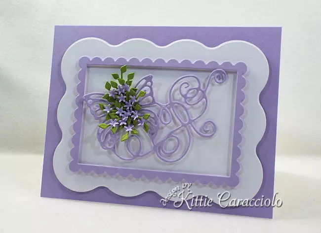 Come see how I made this die cut butterfly flourish embellished with flowers.