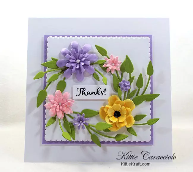 Come see how I made this colorful die cut paper flower wreath card.