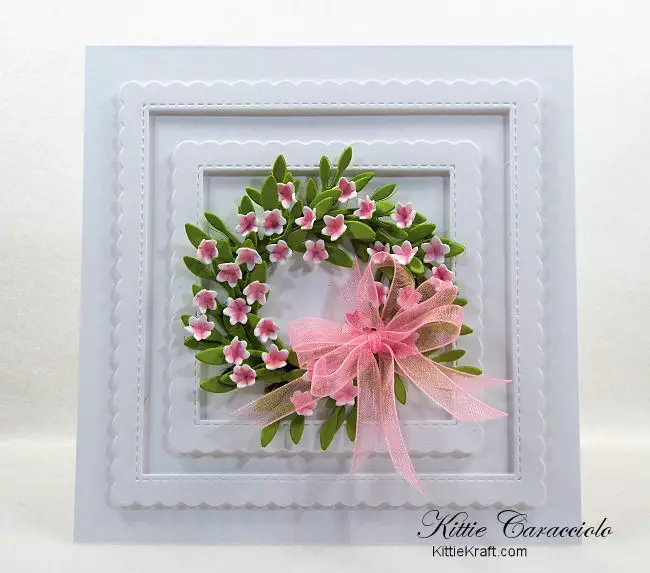 Come see how I made this lovely summer wreath with die cut flowers and foliage.