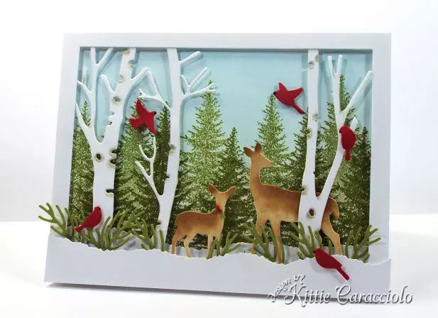 Come see how I made this die cut deer winter scene.