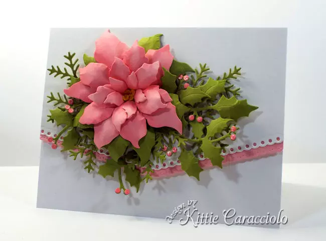 Come see how I made this poinsettia Christmas card with holly and pine sprig branches.