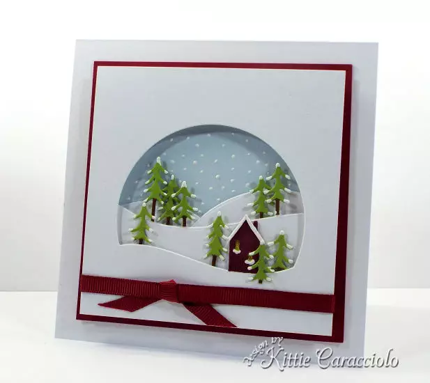 Come see how I made this snowy die cut alpine window scene.