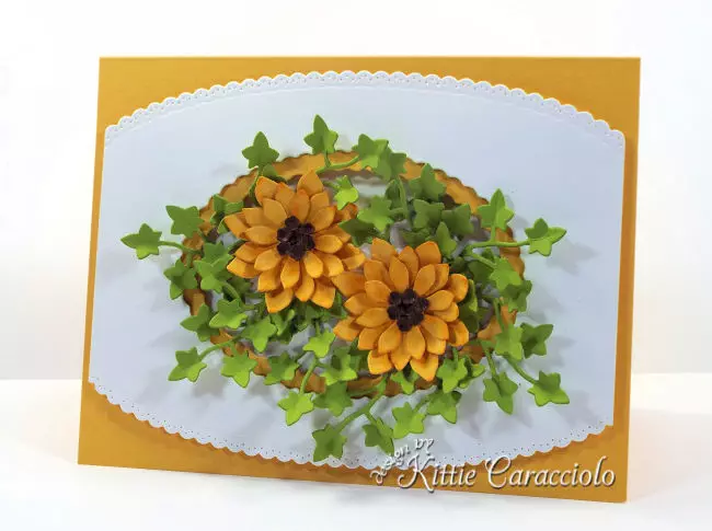 Come see my die cut fall sunflowers card arranged with a pretty white decorative frame.
