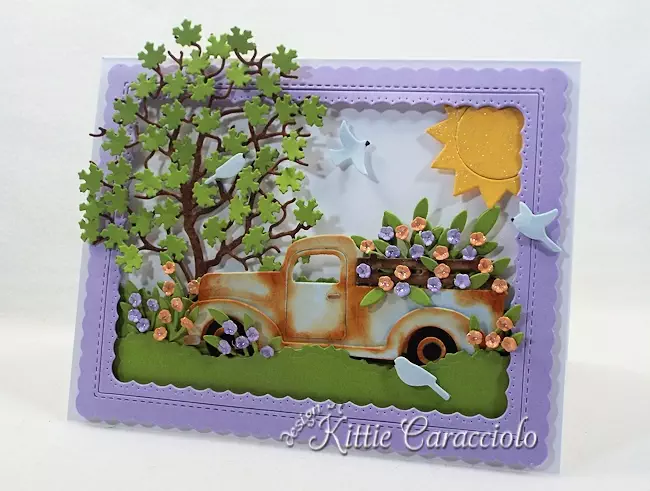 Come and see how I made this die cut truck and flower scene.