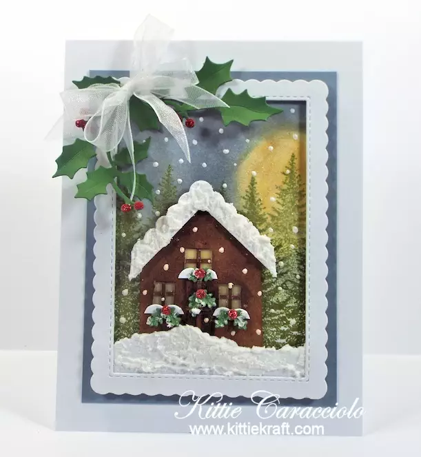 Come see how I made this snowy die cut Christmas cabin scene card.