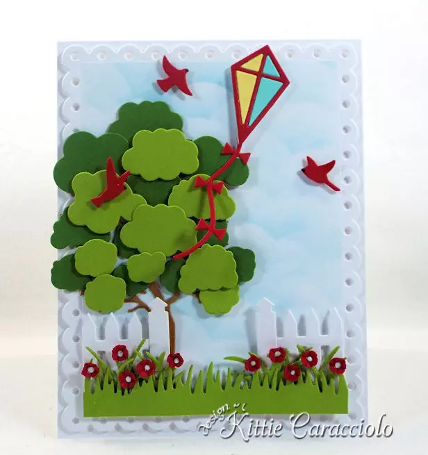 Come see how I made this fun die cut kite scene card.