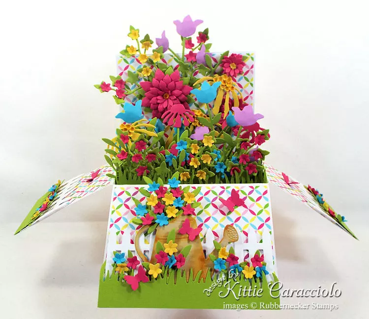 Come check out how I made this colorful pop up flower garden box.