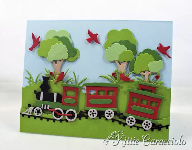 Come see how I made this die cut train scene.
