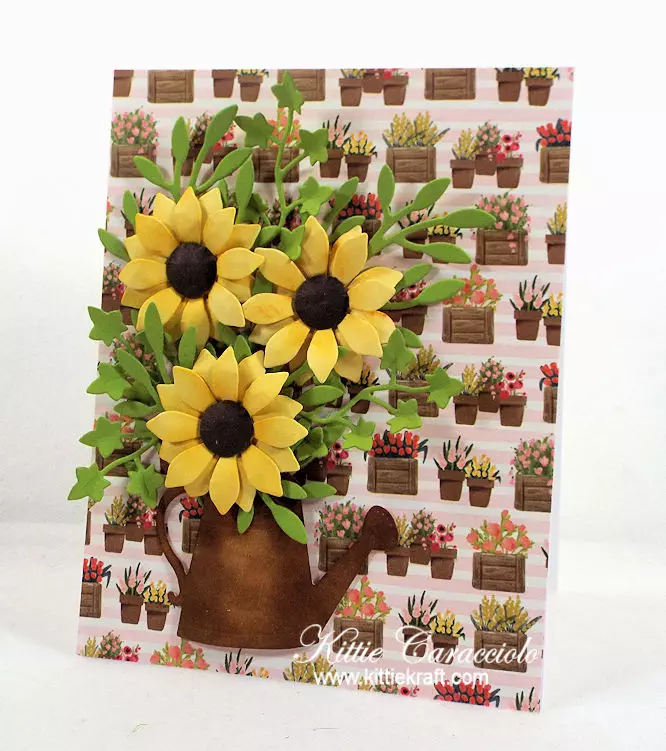 Come see how I made this pretty watering can and flowers card.