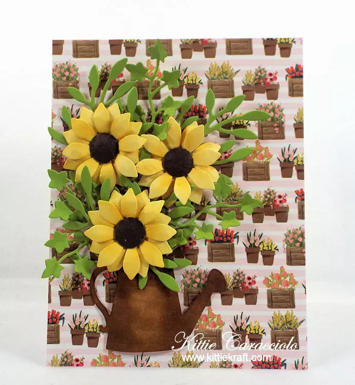Come see how I made this watering can and flowers card.