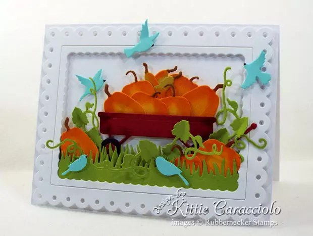 Come see how I made this pumpkin wagon scene card.