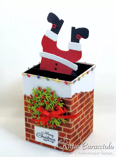 Come see how I made this fun Santa stuck in the chimney box card.
