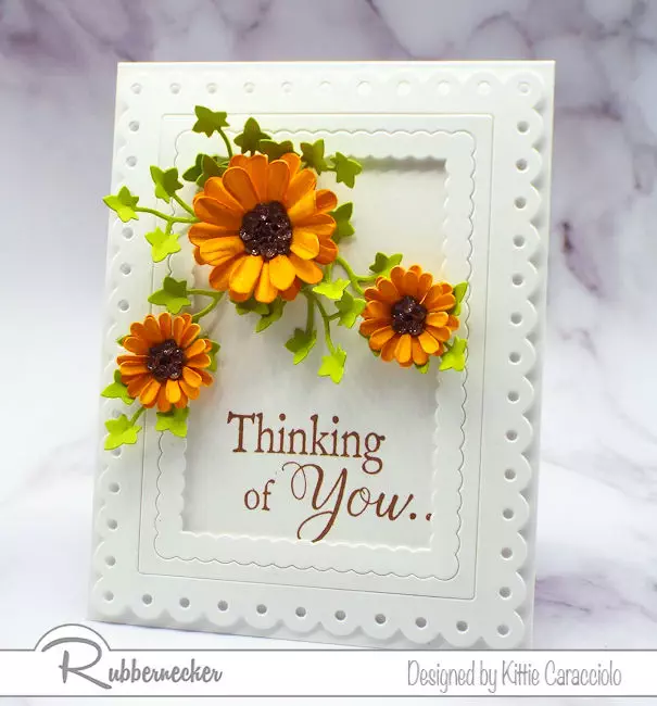 Adding dimensional paper flowers to a clean and simple card really kicks the interest up a notch.  Click through to see how I formed my flowers.