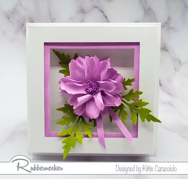 I love to create natural looking dimensional flowers using the paper flower shaping technique.  Click thru to my blog to see how I made this beautiful flower.