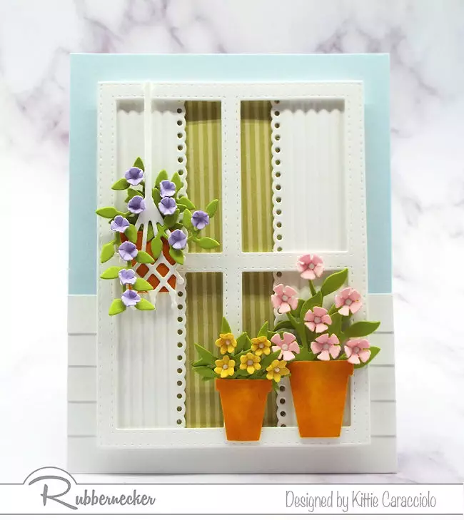 Using a window with flowers on a card front has become so popular. Come over to my blog to see how I made this window scene using dies by Rubbernecker.