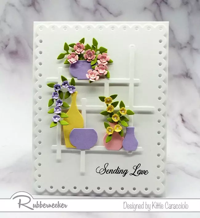 Making a card with pastel colors.  Click on the picture to see how I made this card using dies by Rubbernecker.