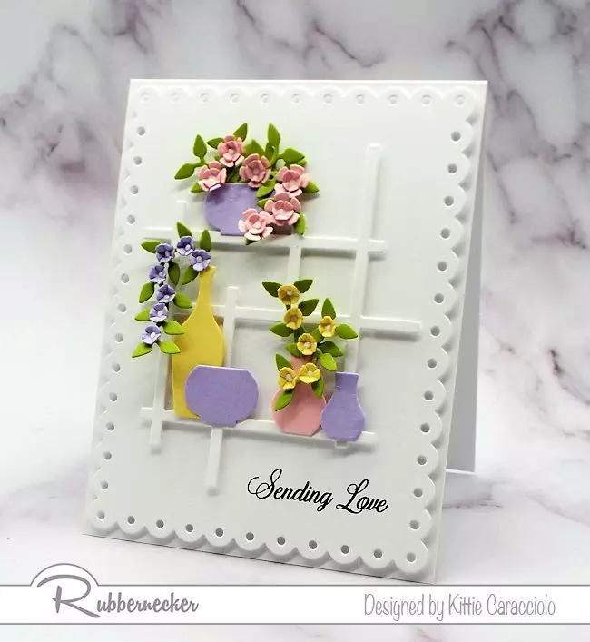 Making a card with pastel colors.  Click on the photo to see how I made this card using dies by Rubbernecker.