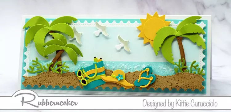 This summer card showing a scene at the beach was made using cardmaking dies