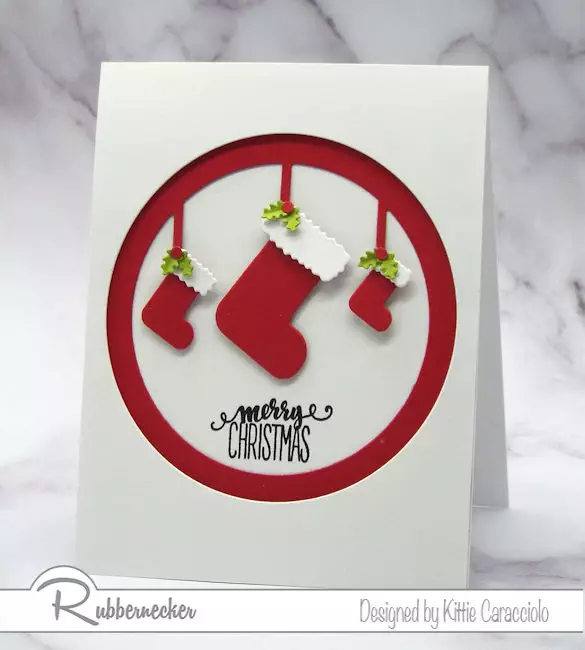 This simple handmade Christmas card with the matted circle frame and stockings is fast and easy for everyone on your list.