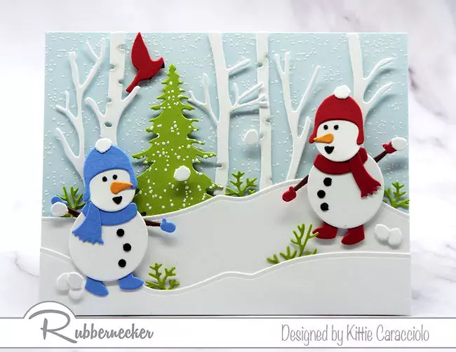 Two die cut snowmen having a snowball fight  featured on one of my snowman card ideas