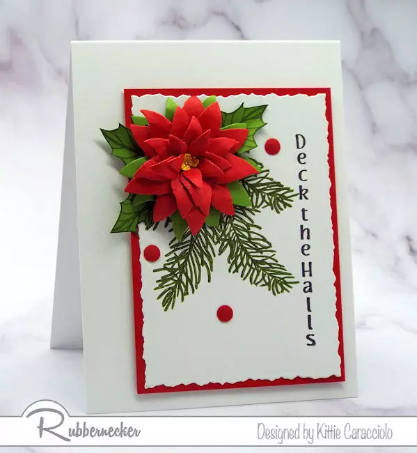 One of my poinsettia Christmas cards featuring one large bloom hand shaped using die cuts from Rubbernecker