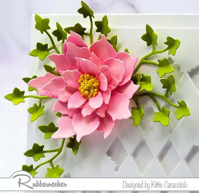 Who knew you could use poinsettia die cuts from Rubbernecker to make this stunning paper summer rose?
