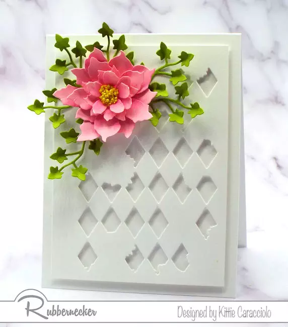 This beautiful pink summer rose started out as poinsettia die cuts from Rubbernecker showing how to use Christmas cardmaking dies all year round