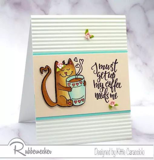 A stamped and colored coffee cat from Rubbernecker adorning the front of a handmade greeting card