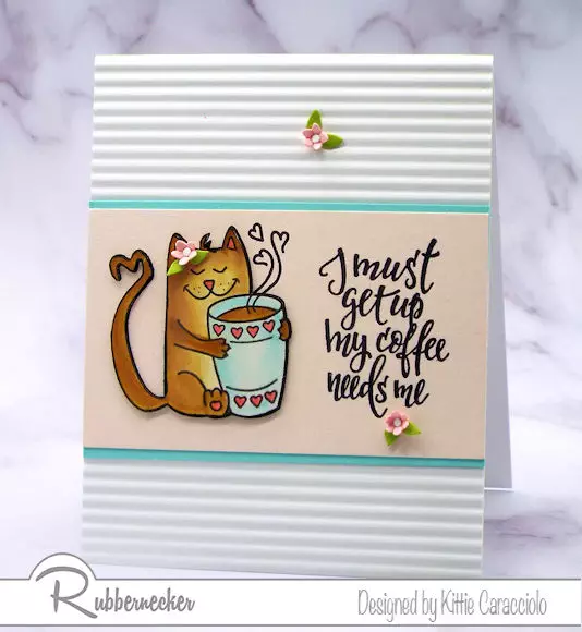 An adorable handmade greeting card with a very happy hand stamped and colored coffee cat from Rubbernecker relishing her first sip