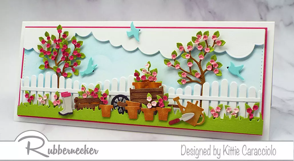 you can modify die cuts like this white picket fence and trees in bloom on this pretty slimline garden card loaded with details from Rubbernecker dies