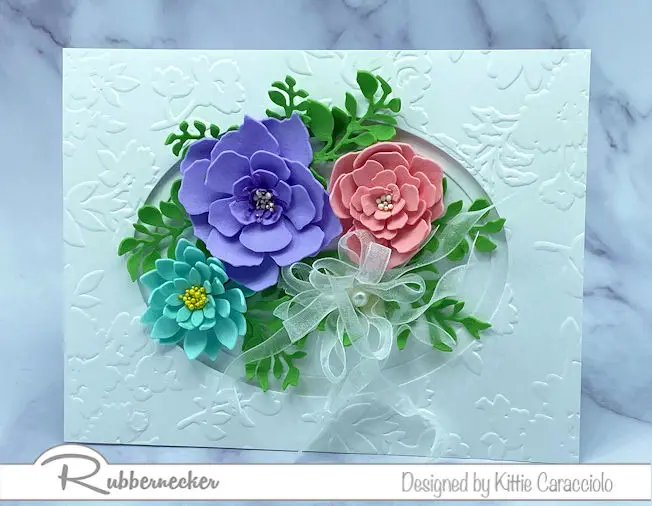 sizzix sculpting foam and flower dies from Rubbernecker were used to make these three realistic looking flowers