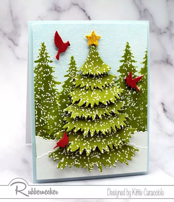 a new set of cleverly designed Christmas tree dies from Kittiekraft by Rubbernecker created this stunning winter card