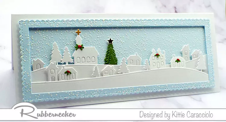 you can make a winter slimline card like this mostly white against a snowy blue using some new dies from Kittiekraft by Rubbernecker