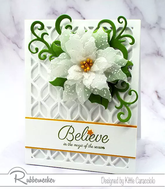 Learn how to make a die cut vellum poinsettia like the one on this handmade Christmas card