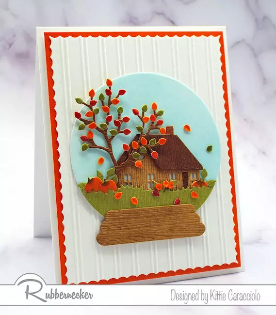 this handmade snow globe card for fall feels so cozy with the scene all tucked into that little space all made with dies from Rubbernecker