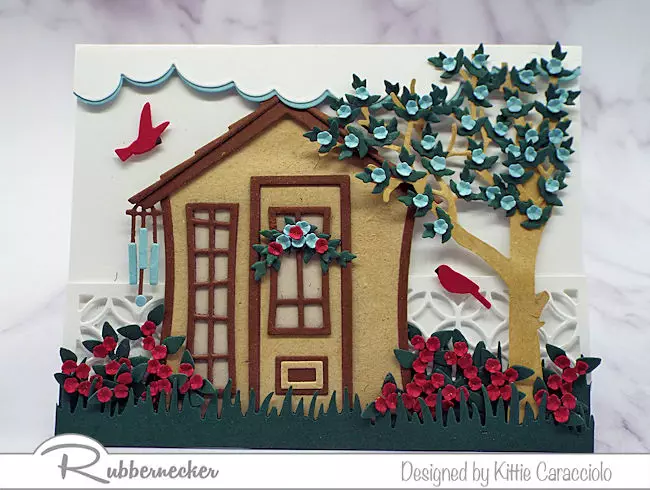 a die cut garden shed decorates this handmade greeting card from KittieKraft by Rubbernecker for an detailed spring scene