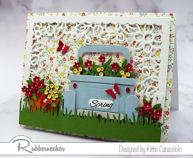 learn how to layer die cut frames on cards like this one with a classic pick up truck loaded with tiny paper flowers