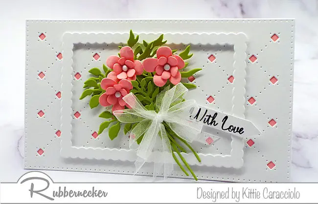 a pretty pink and white handmade card created using new mini slimline dies from Rubbernecker