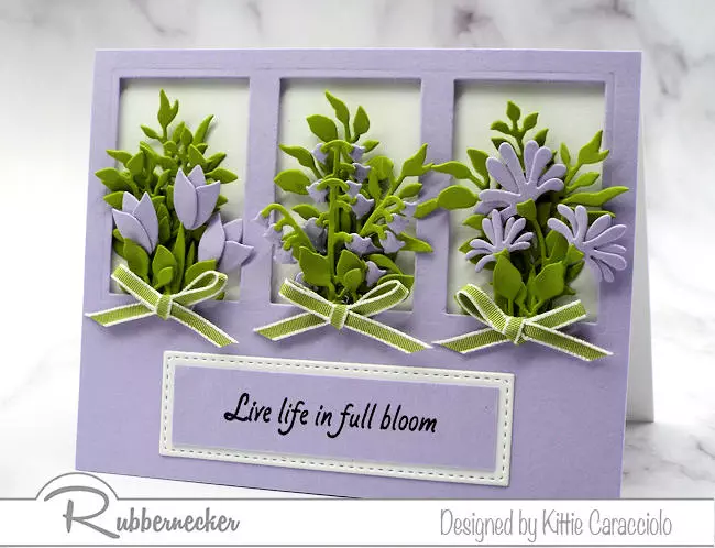 new mini  slimline dies from Rubbernecker and flower dies from KittieKraft by Rubbernecker we used to make this purple mini slimline floral card