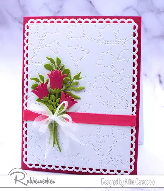 Pierced background dies can create beautiful handmade card background as shown here with hot pink flowers that perfectly coordinate with the background design.