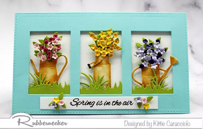 learn how to make a rust look with ink as on these vintage watering cans holding die cut paper flowers