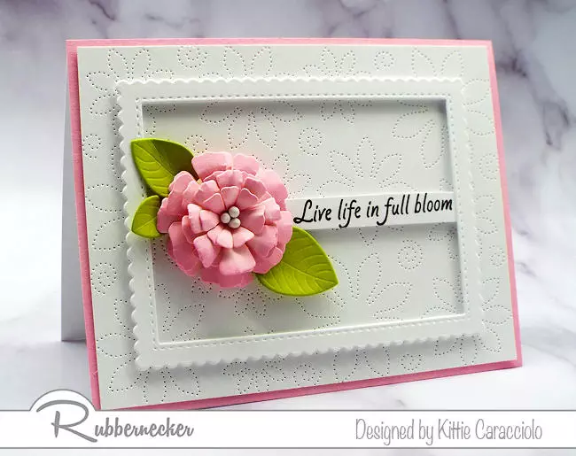 pierced cover dies can create pretty, detailed all-over backgrounds for cards like with this floral themed project made in white and pink